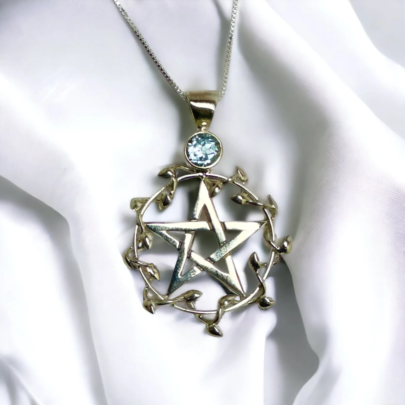 Faceted Blue Topaz Vine Leaf Pendant